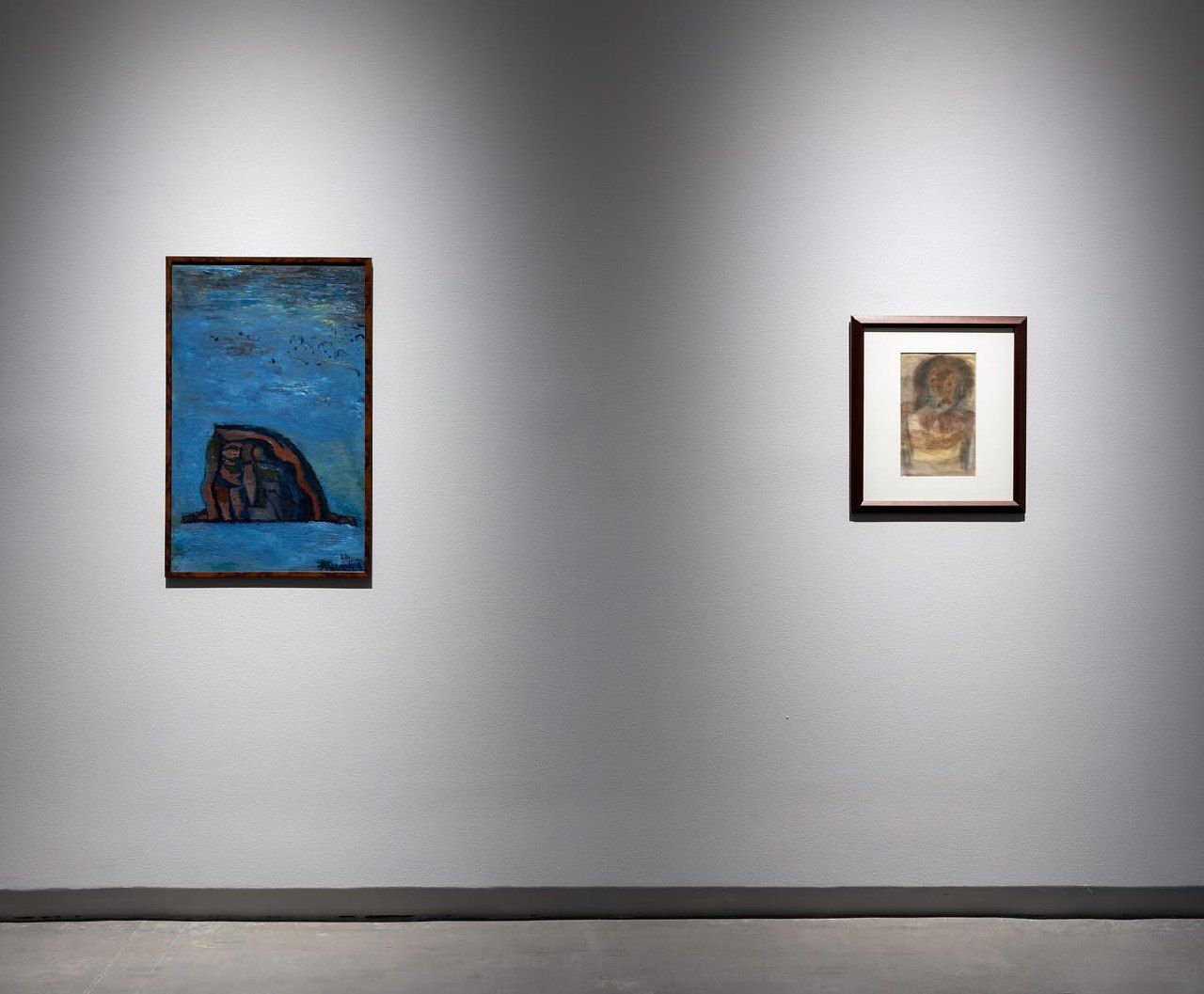 Image: Eduard Puterbrot, Mountain, 1988  (left) and Kamala Ibrahim Ishag, Portrait, 1969. Installation view: Drawing Time: Duets, Al Mureijah Art Spaces, Sharjah, 2024. Photo: Motaz Mawid.
