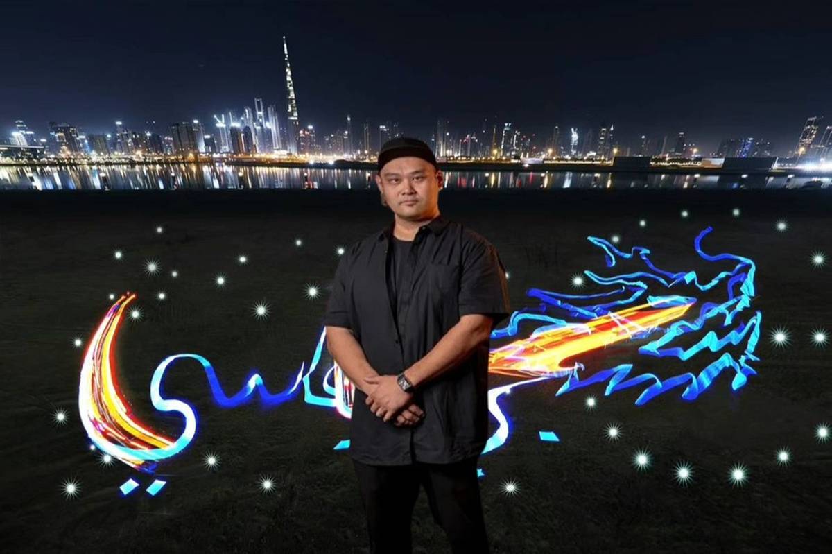 Roy Wang and the creativity of combining light, Chinese and Arabic calligraphy and 3 cars / The Chinese Dragons shined in Dubai 
