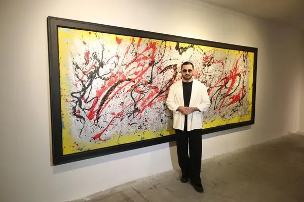 Figo Birjandian and the Red-and-Black Uproar in a Yellow Panorama